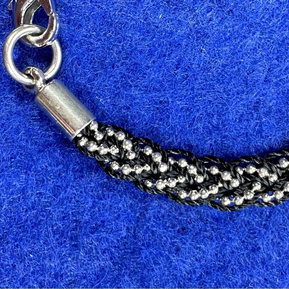 Boho Braided Silver tone and black bracelet with tassel.